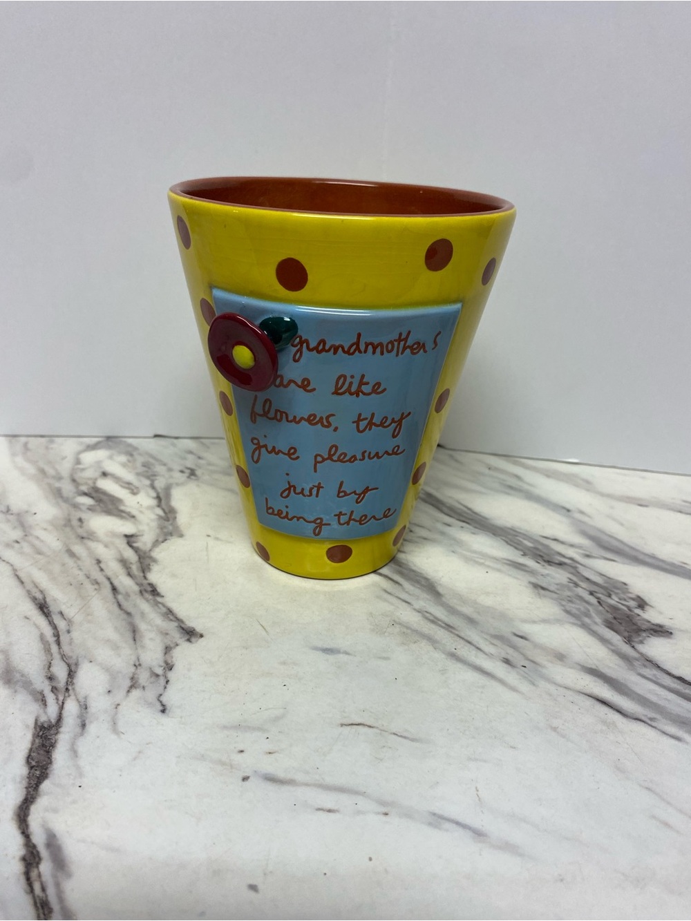 Department 56 Yellow Polka Dot Flower Pot with Blue Message Panel and Red Flower